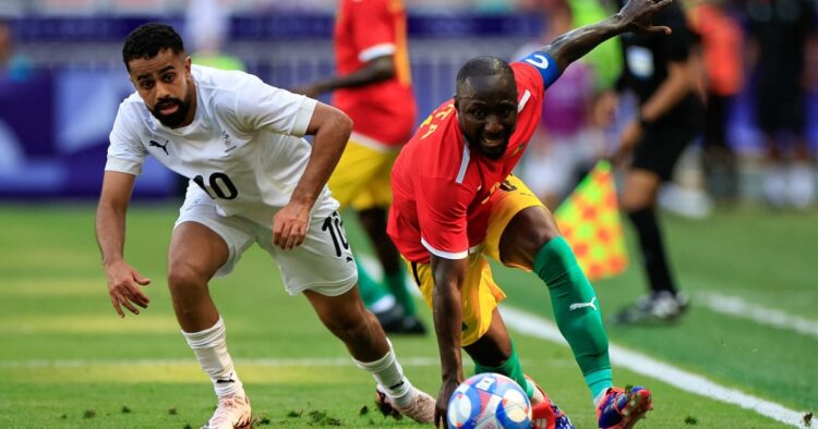 In a thrilling match held in Nice, New Zealand overcame a valiant challenge from Guinea to secure a hard-fought 2-1 victory, while the Pharaohs of Egypt were held to a goalless draw.