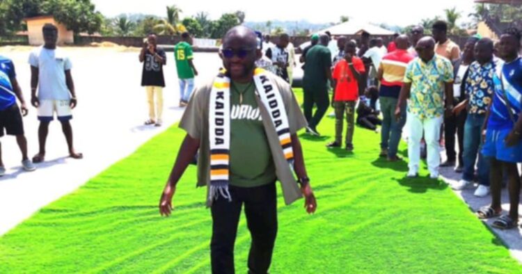 Kailahun Town Chief pours libation to begin Dr Saffa Abdulai's artificial turf distribution