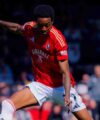 Kallum Cesay scores as Salford City win the first leg of their playoff tie at Grimsby